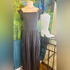 SOLD•Anthropologie Grey Ruffle Wide Leg Jumpsuit With Front Slanted Pockets